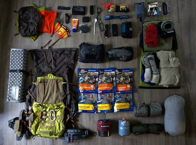 A rugged tactical bug out bag packed with essential survival gear for emergency preparedness.